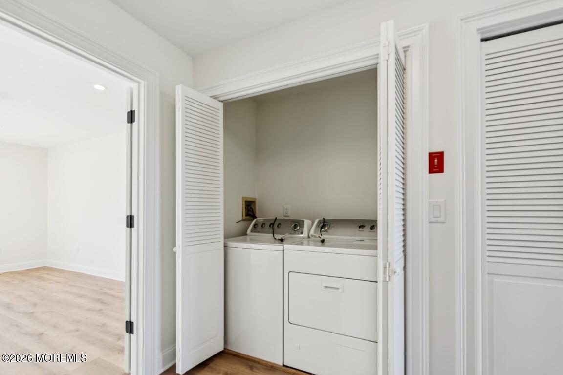 16 Shore Drive Long Branch, NJ 07740 - Photo 15 of 26 a bathroom with a sink vanity and a mirror