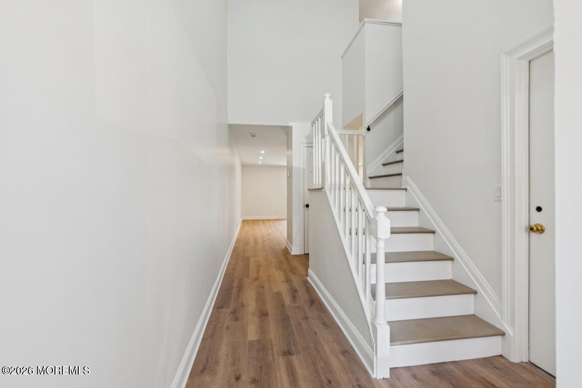 16 Shore Drive Long Branch, NJ 07740 - Photo 2 of 26 a view of a hallway with wooden floor and entryway