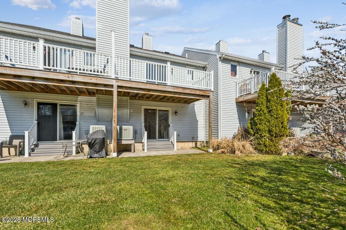 16 Shore Drive Long Branch, NJ 07740 - Photo 23 of 26 a front view of a house with a garden