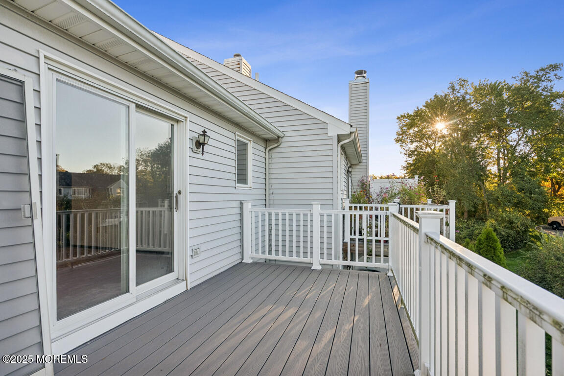 16 Shore Drive Long Branch, NJ 07740 - Photo 26 of 26 a view of a balcony with wooden floor and fence