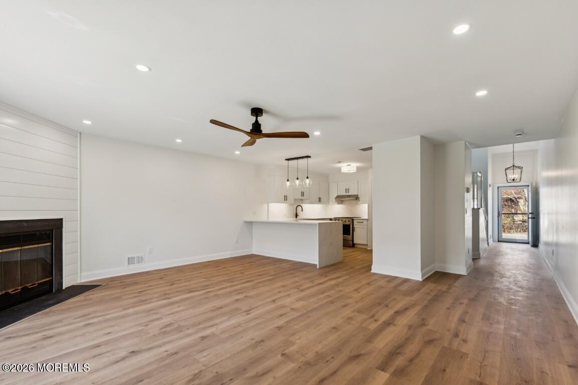 16 Shore Drive Long Branch, NJ 07740 - Photo 5 of 26 a view of a kitchen with a sink and a refrigerator