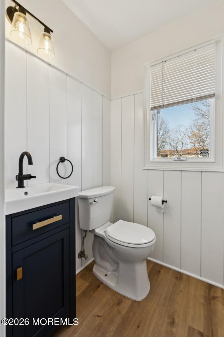 16 Shore Drive Long Branch, NJ 07740 - Photo 10 of 26 a bathroom with a toilet a sink and a mirror