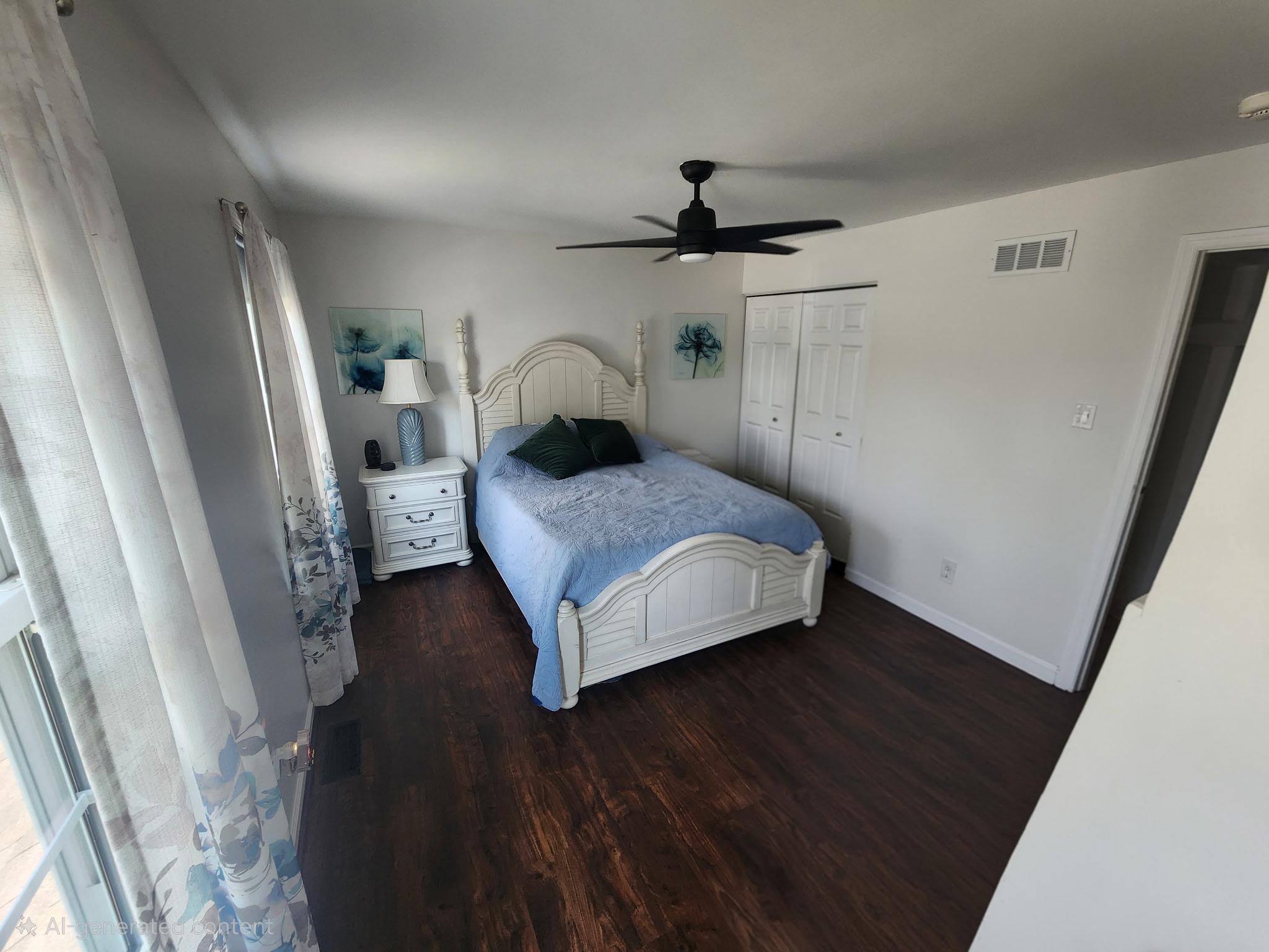 812 Kinross Avenue York, PA 17402 - Photo 11 of 29 a bedroom with a bed and a mirror