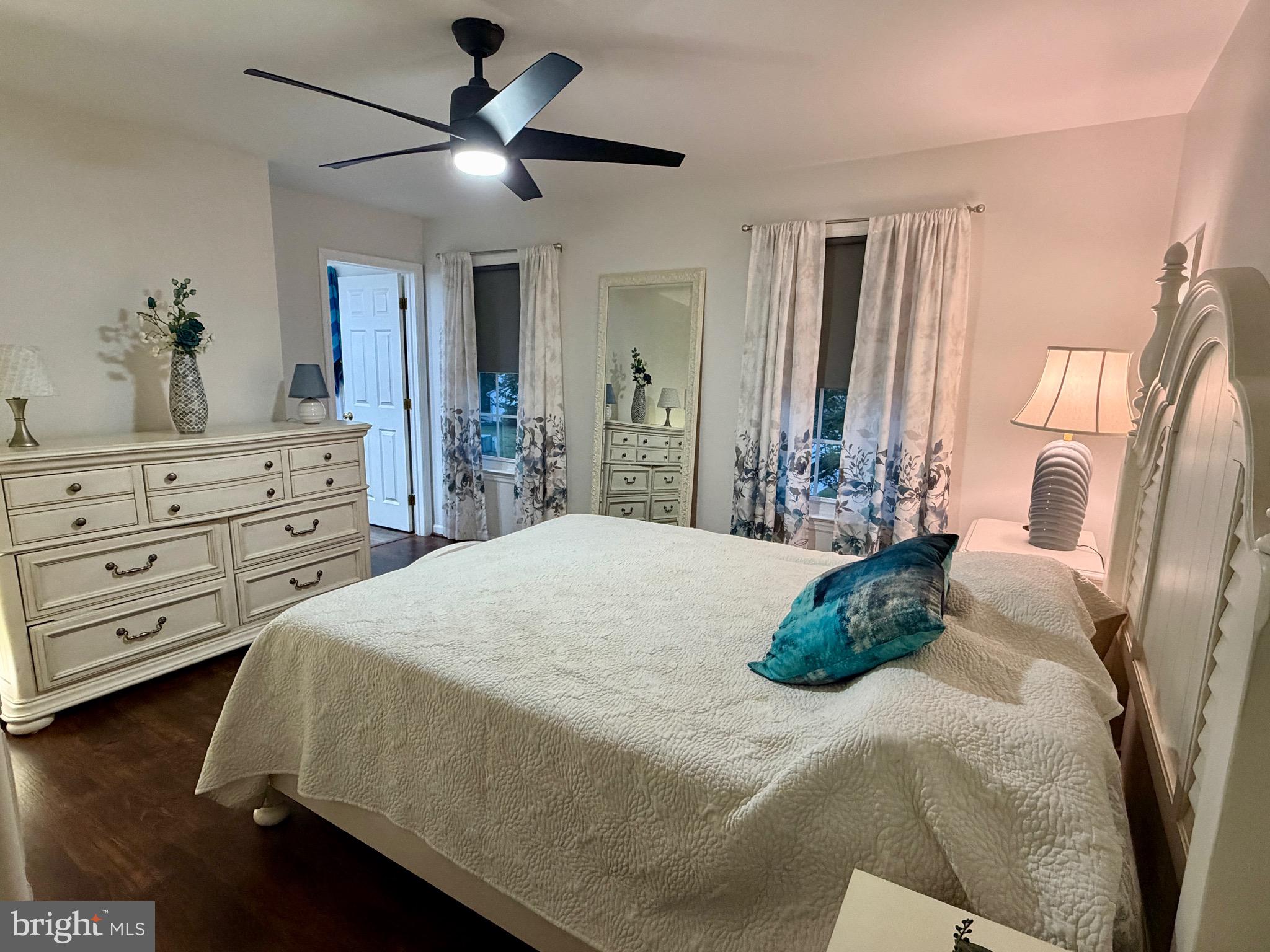 812 Kinross Avenue York, PA 17402 - Photo 13 of 29 a bedroom with a bed and a chandelier