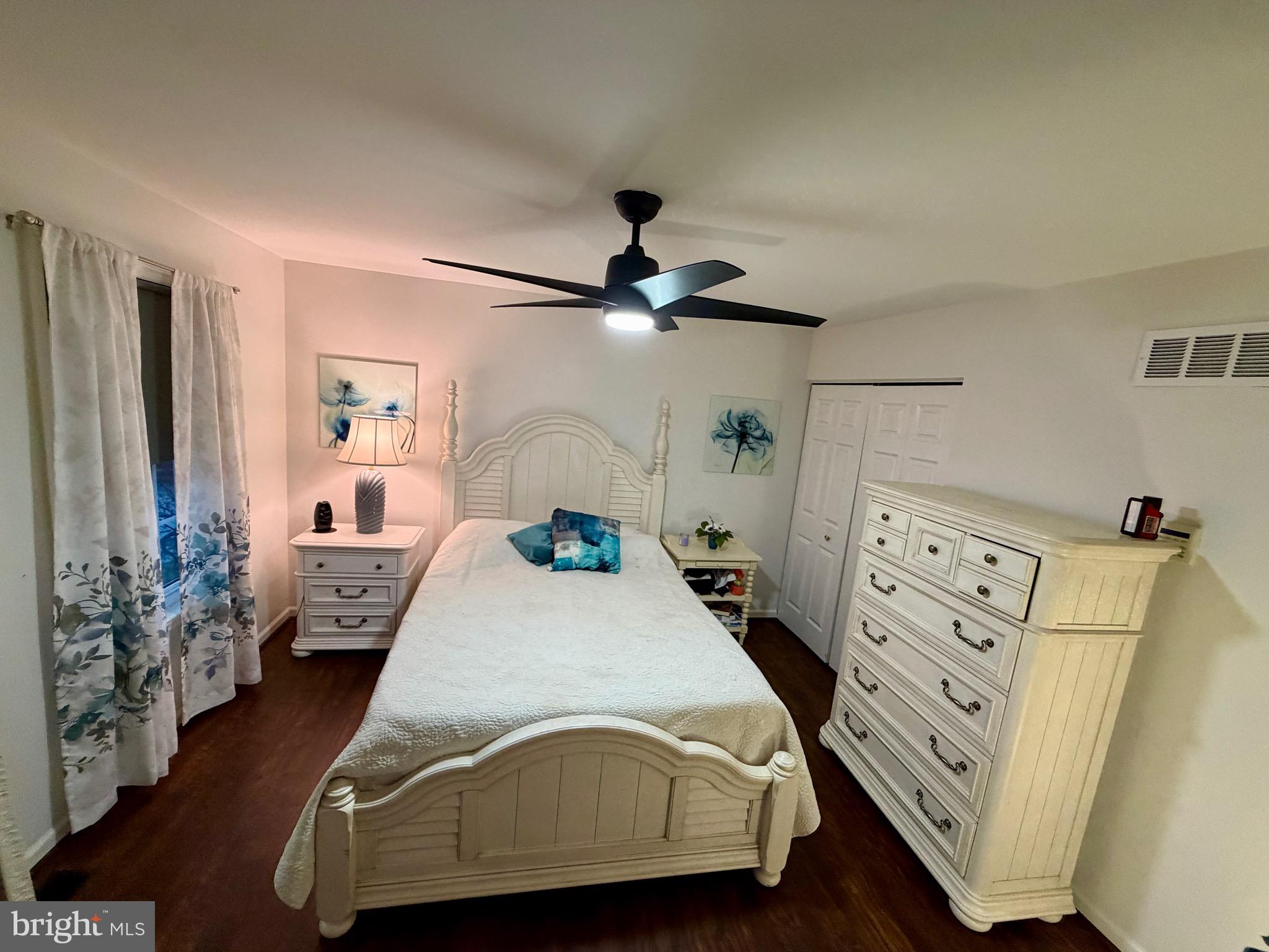 812 Kinross Avenue York, PA 17402 - Photo 14 of 29 a bedroom with a bed and a chandelier