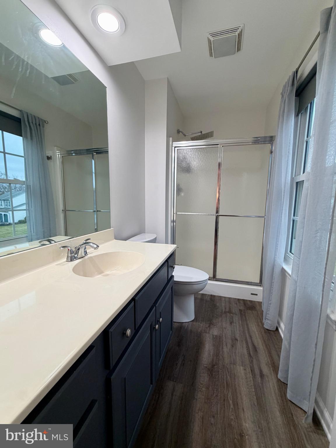 812 Kinross Avenue York, PA 17402 - Photo 15 of 29 a bathroom with a sink a toilet a mirror and shower