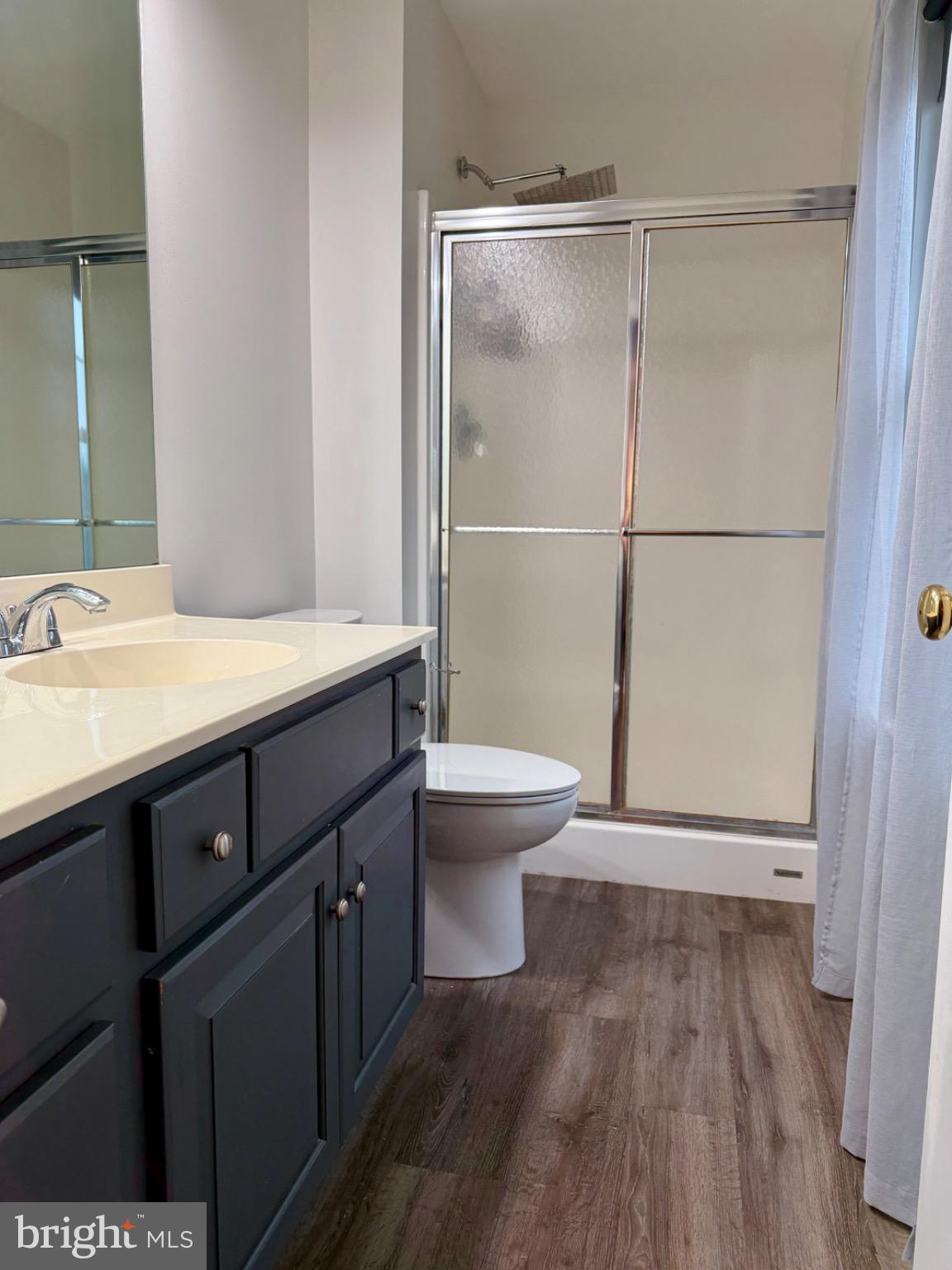 812 Kinross Avenue York, PA 17402 - Photo 16 of 29 a bathroom with a sink a toilet a mirror and shower