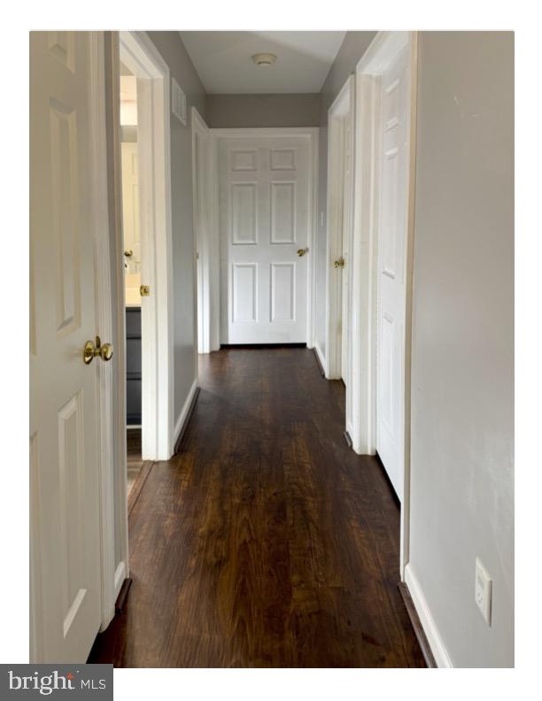812 Kinross Avenue York, PA 17402 - Photo 17 of 29 a view of a hallway with wooden floor