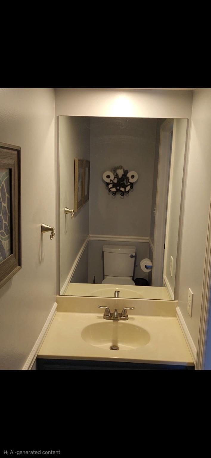 812 Kinross Avenue York, PA 17402 - Photo 22 of 29 a bathroom with a sink and a mirror