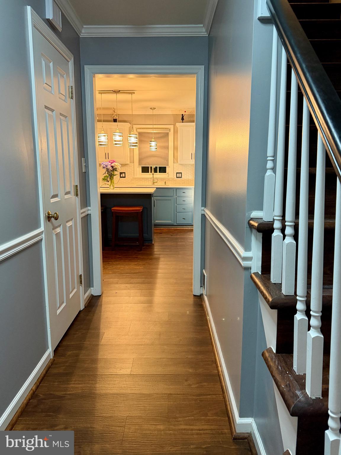 812 Kinross Avenue York, PA 17402 - Photo 5 of 29 a view of a hallway with wooden floor and staircase