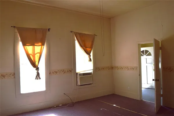 a view of a window in an empty room