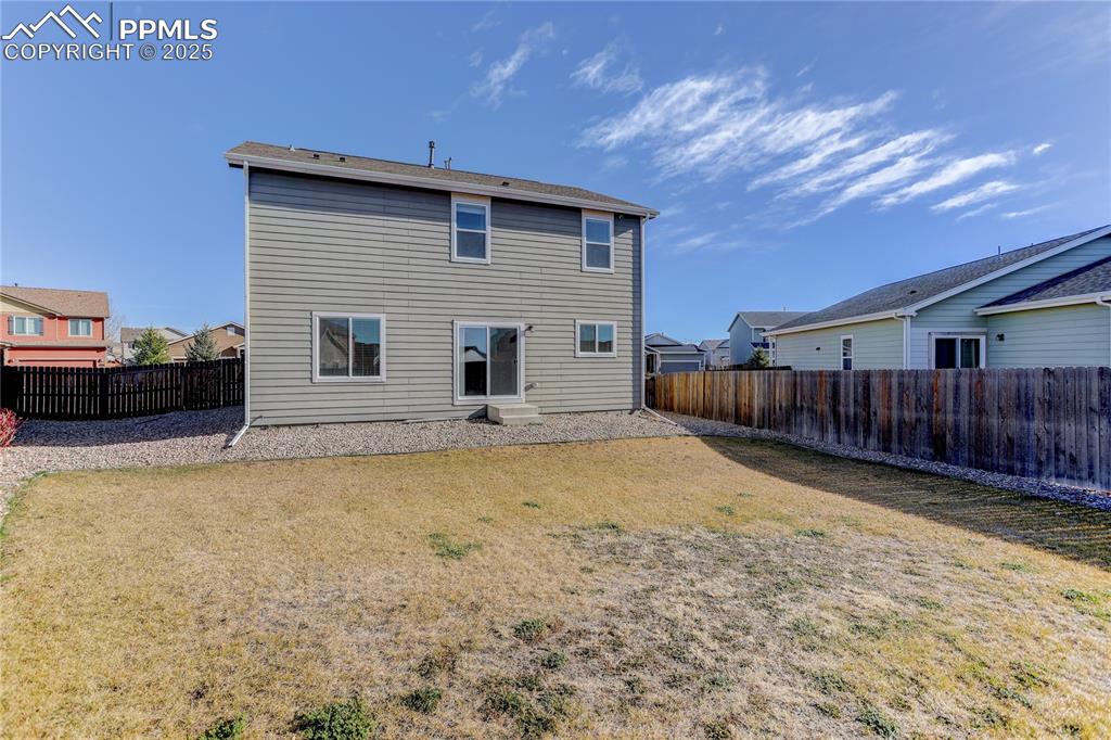 10179 Intrepid Way Colorado Springs, CO 80925 - Photo 18 of 20 Gated access to backyard