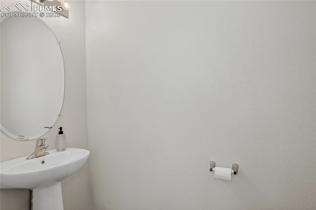 10179 Intrepid Way Colorado Springs, CO 80925 - Photo 8 of 20 Powder room - main level