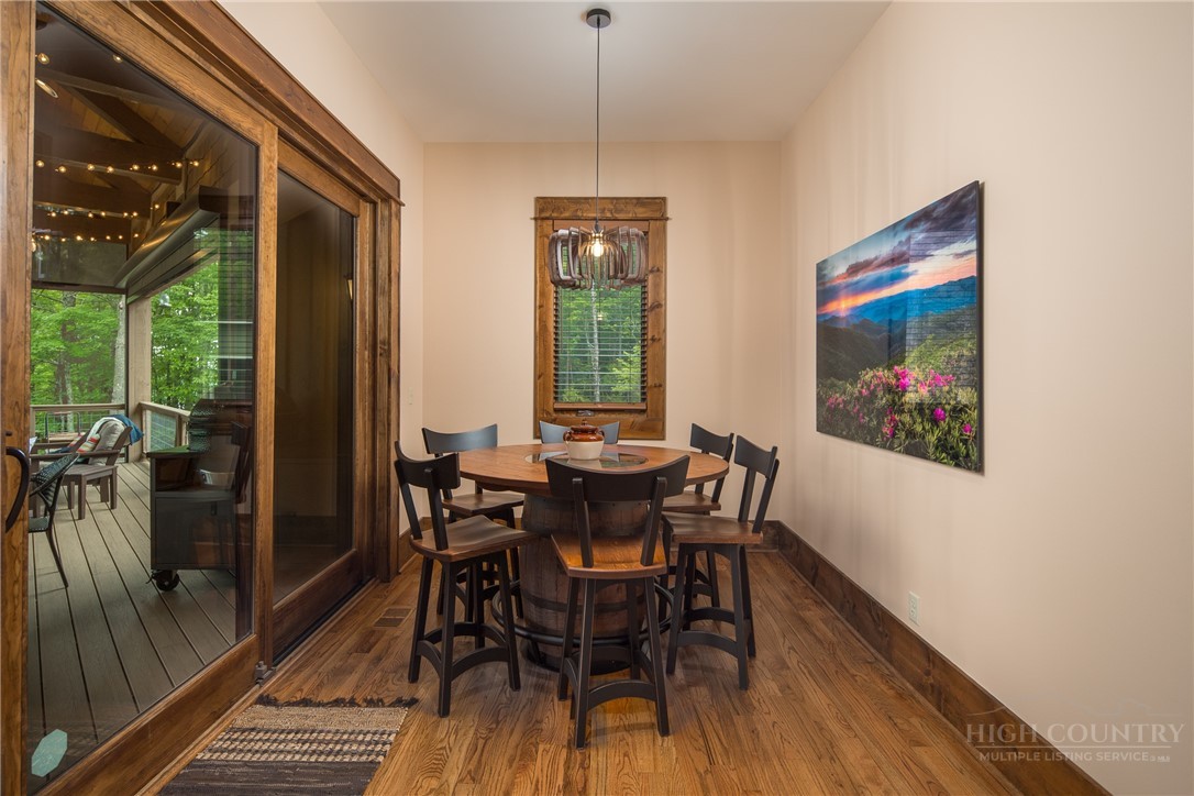 115 Passionflower Trail Boone, NC 28607 - Photo 8 of 50 a view of a dining room with furniture window and outside view