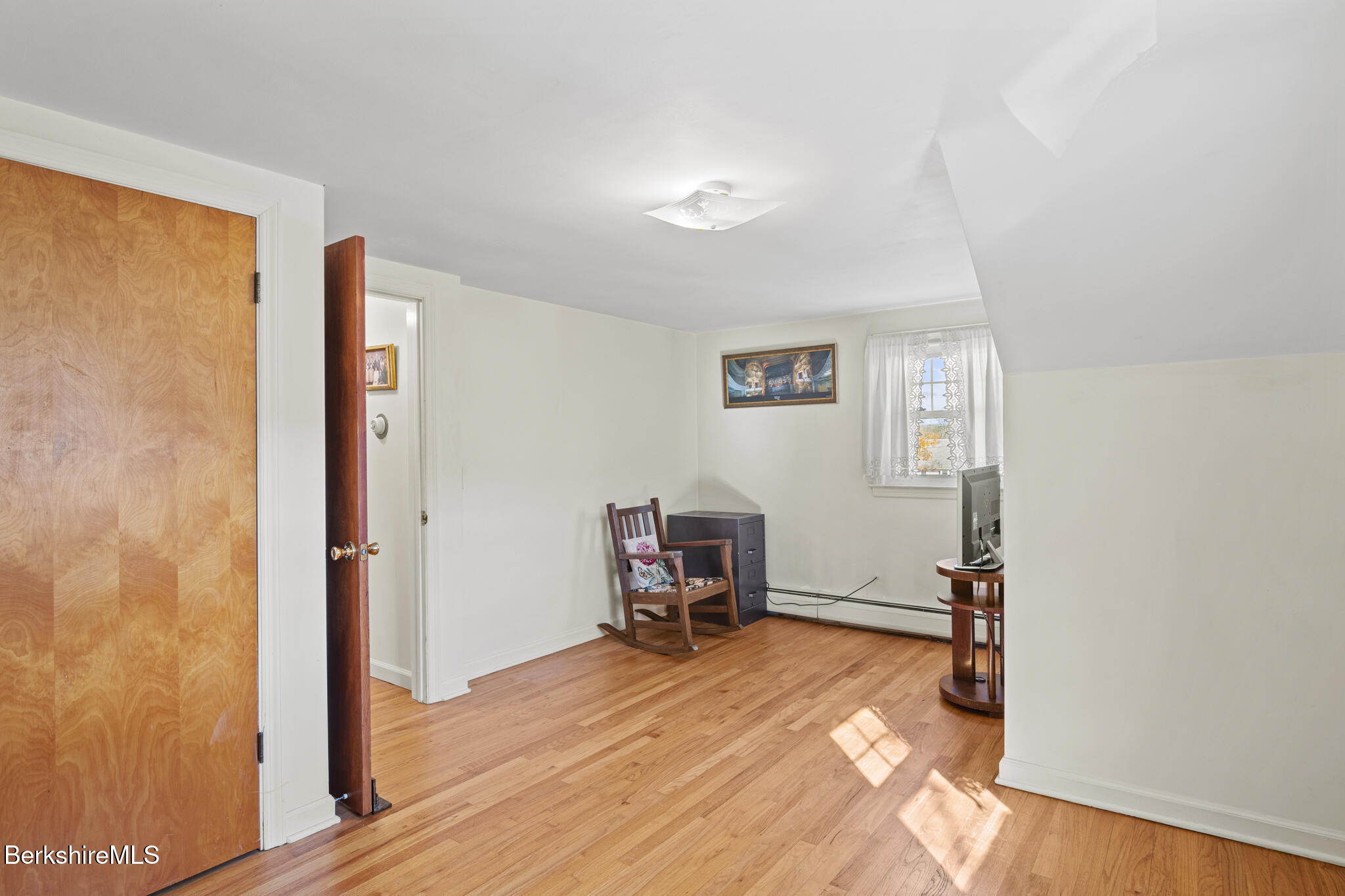 82 Quirico Drive Pittsfield, MA 01201 - Photo 22 of 30 a view of a livingroom with furniture and a window