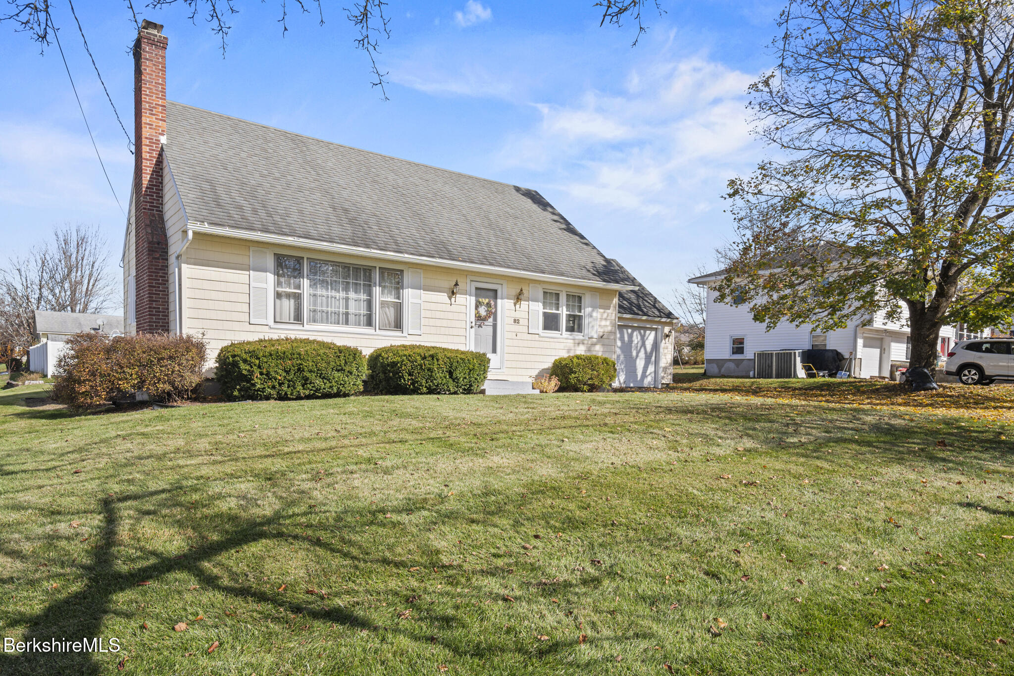 82 Quirico Drive Pittsfield, MA 01201 - Photo 3 of 30 a front view of a house with a garden