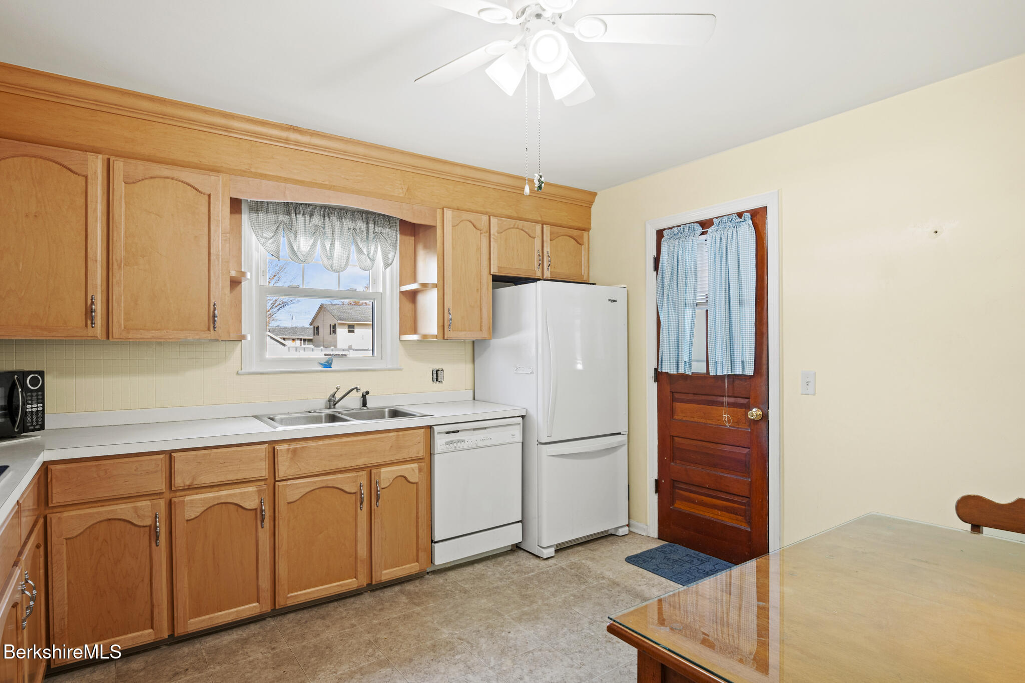 82 Quirico Drive Pittsfield, MA 01201 - Photo 5 of 30 a kitchen with appliances a sink and cabinets