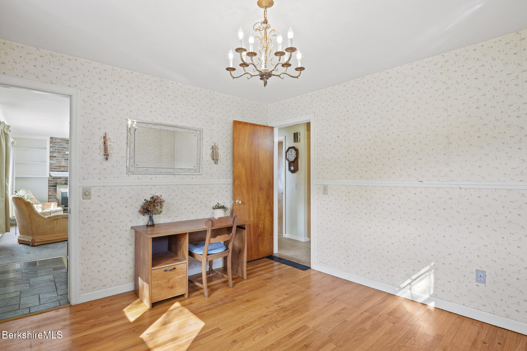 82 Quirico Drive Pittsfield, MA 01201 - Photo 7 of 30 a workspace with furniture and wooden floor