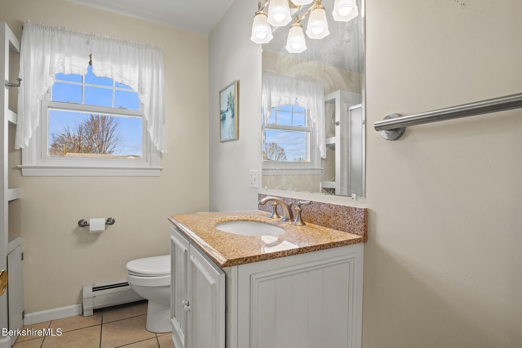 82 Quirico Drive Pittsfield, MA 01201 - Photo 10 of 30 a bathroom with a sink a toilet and shower
