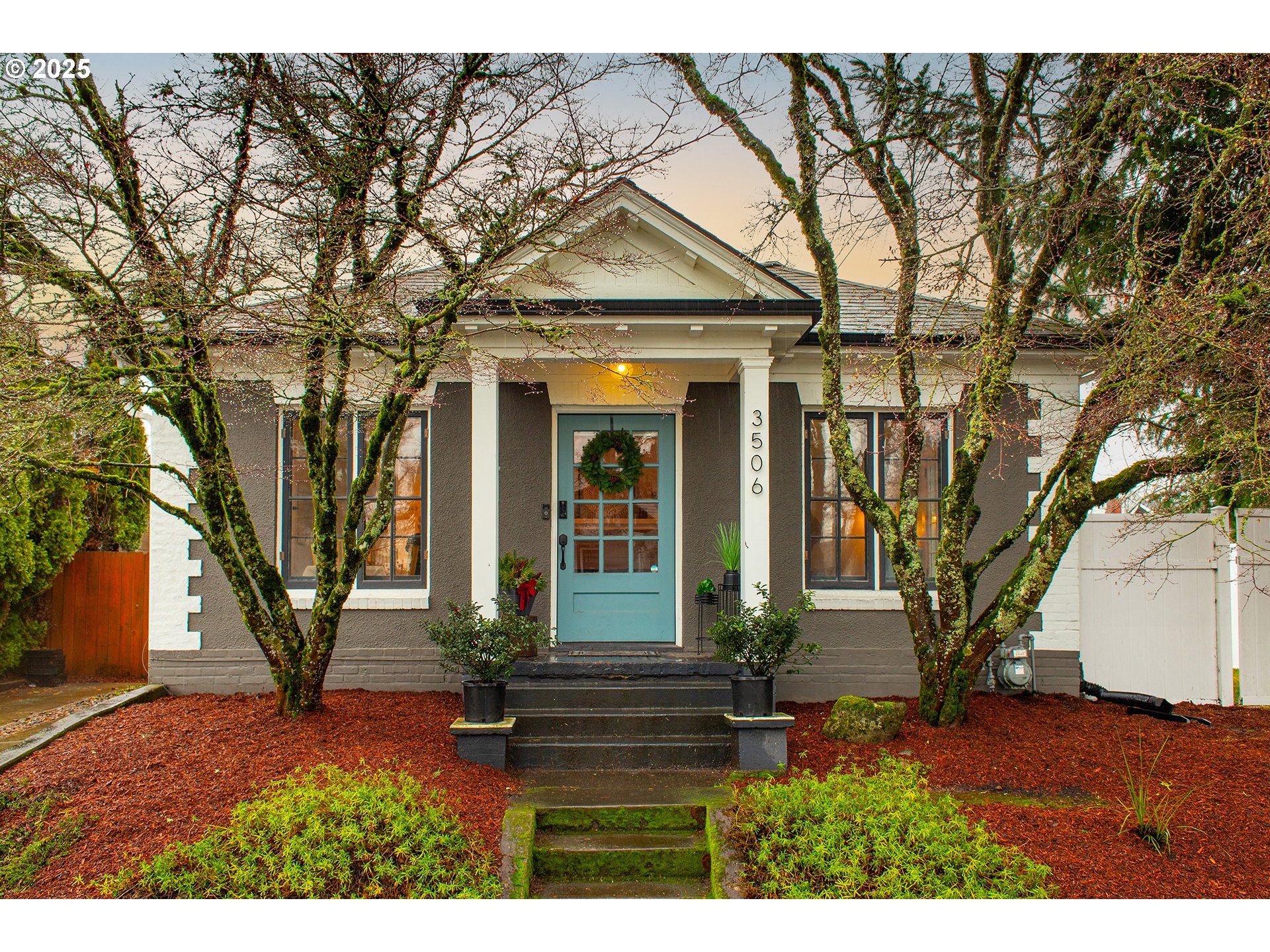 3506 Northeast 78th Avenue Portland, OR 97213 - Photo 1 of 41 a front view of a house with garden