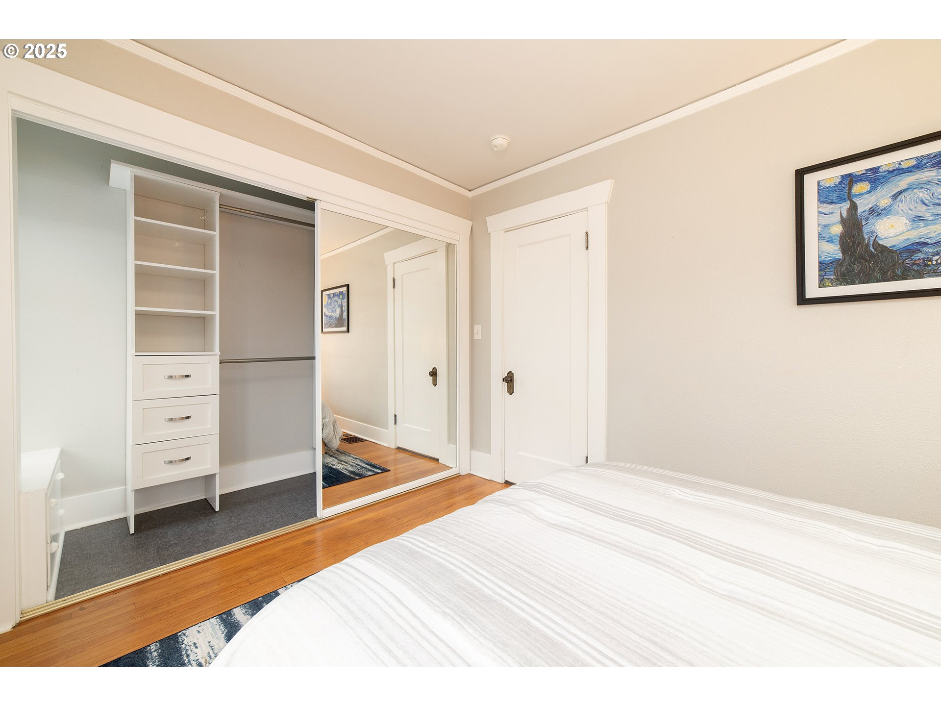 3506 Northeast 78th Avenue Portland, OR 97213 - Photo 14 of 41 a bedroom with a bed and a view of closet