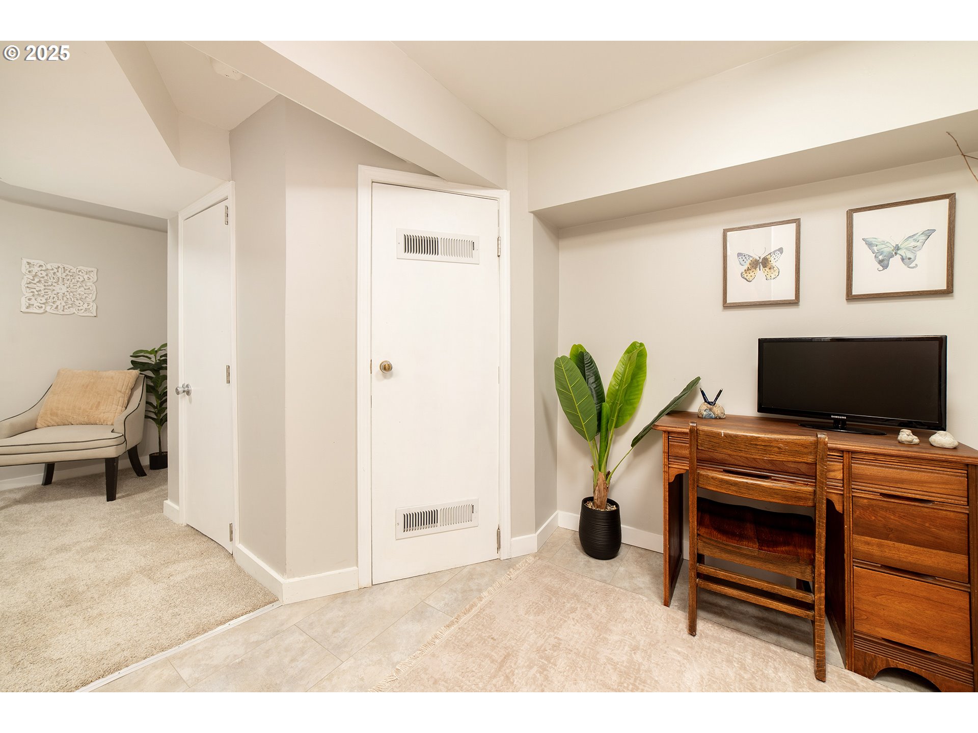3506 Northeast 78th Avenue Portland, OR 97213 - Photo 35 of 41 a bedroom with a bed and a flat screen tv