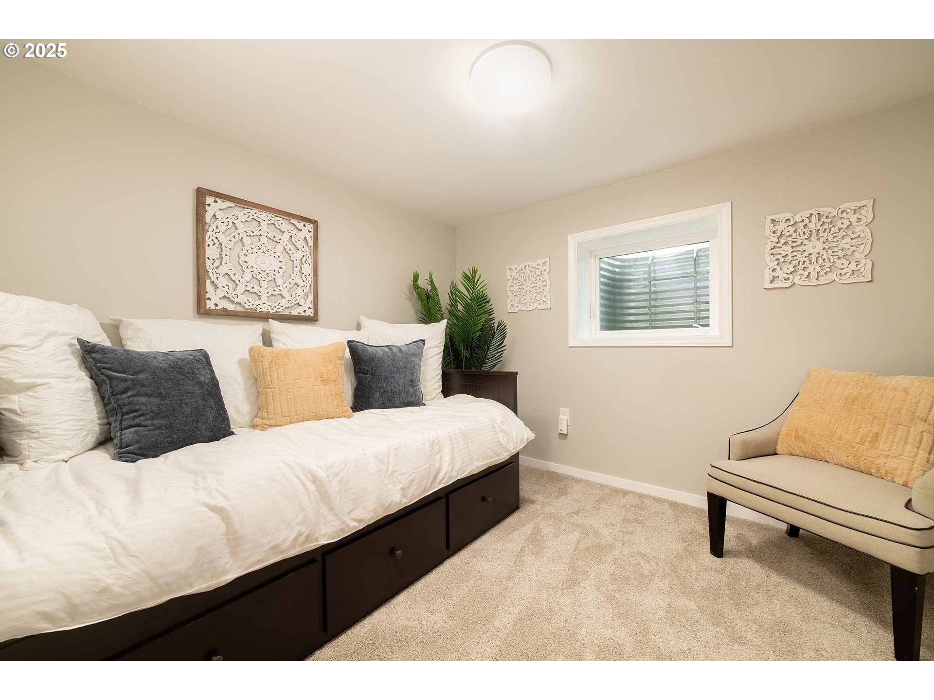 3506 Northeast 78th Avenue Portland, OR 97213 - Photo 36 of 41 a bedroom with a bed and a couch