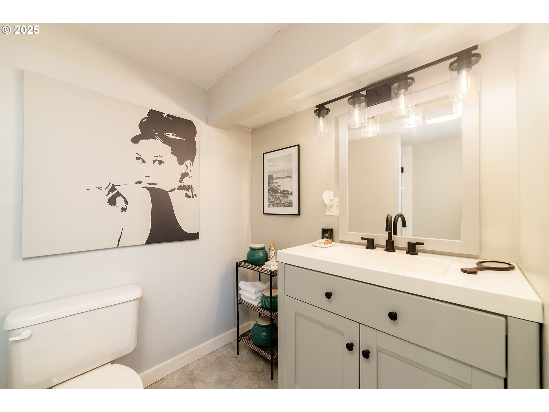 3506 Northeast 78th Avenue Portland, OR 97213 - Photo 37 of 41 a bathroom with a sink and a mirror