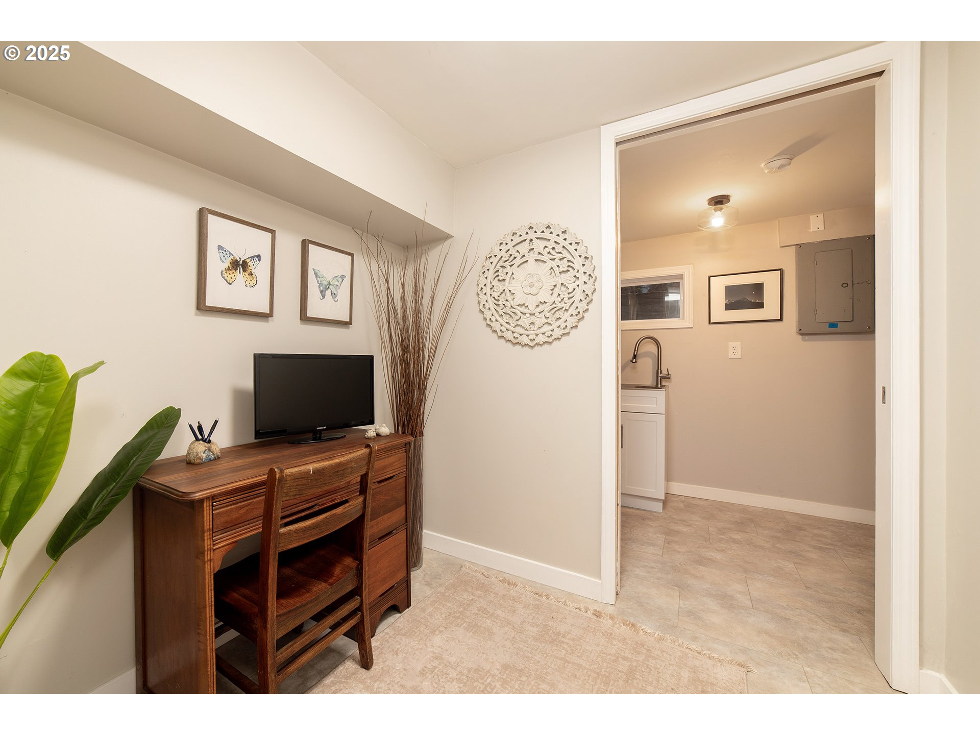 3506 Northeast 78th Avenue Portland, OR 97213 - Photo 39 of 41 a view of workspace with painting on the wall