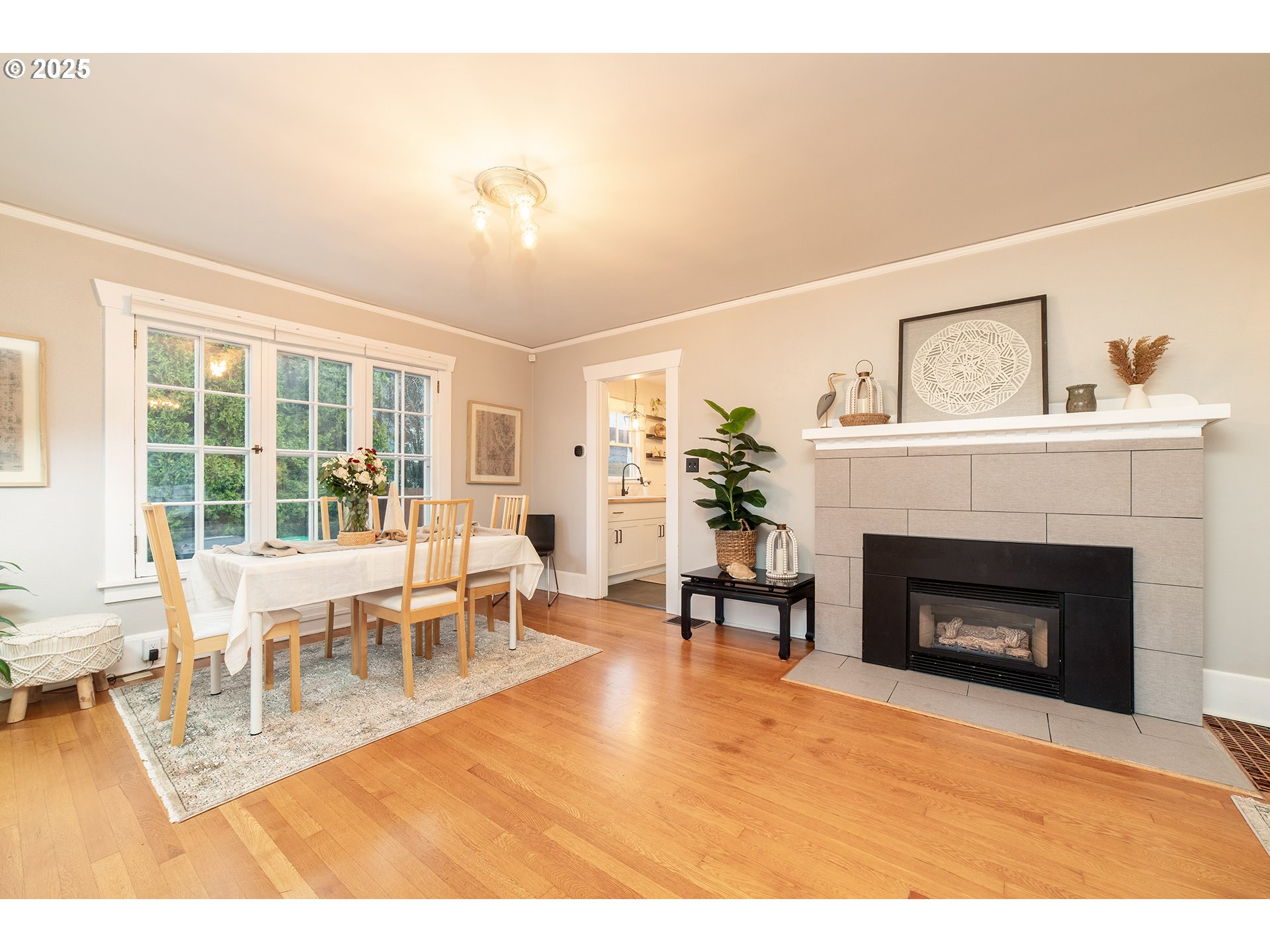 3506 Northeast 78th Avenue Portland, OR 97213 - Photo 6 of 41 a living room with furniture a fireplace and a large window