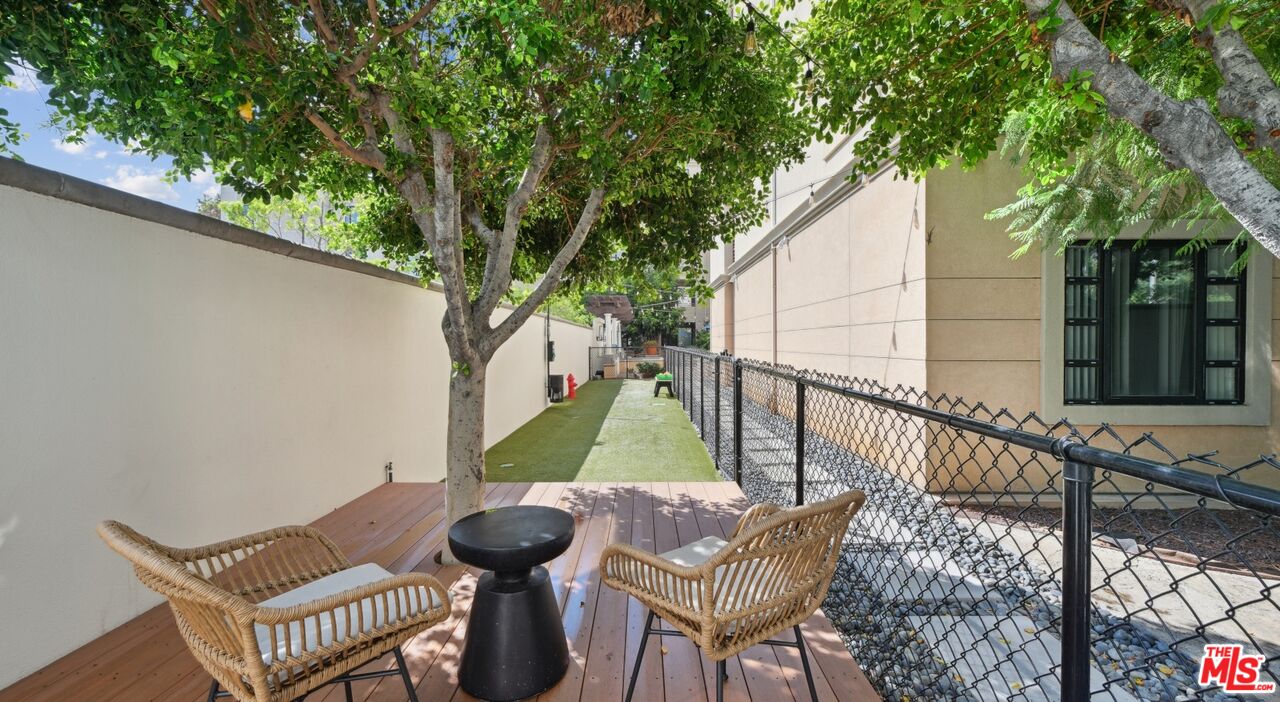 290 North Hudson Avenue, Unit 403W Pasadena, CA 91101 - Photo 13 of 25 a view of a chair and table in the balcony