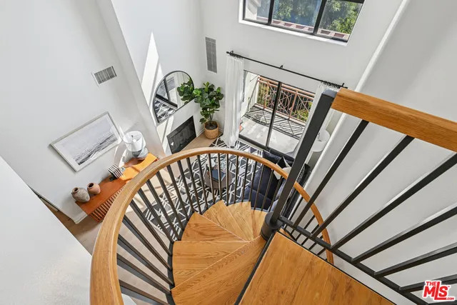a view of stairs and a front door