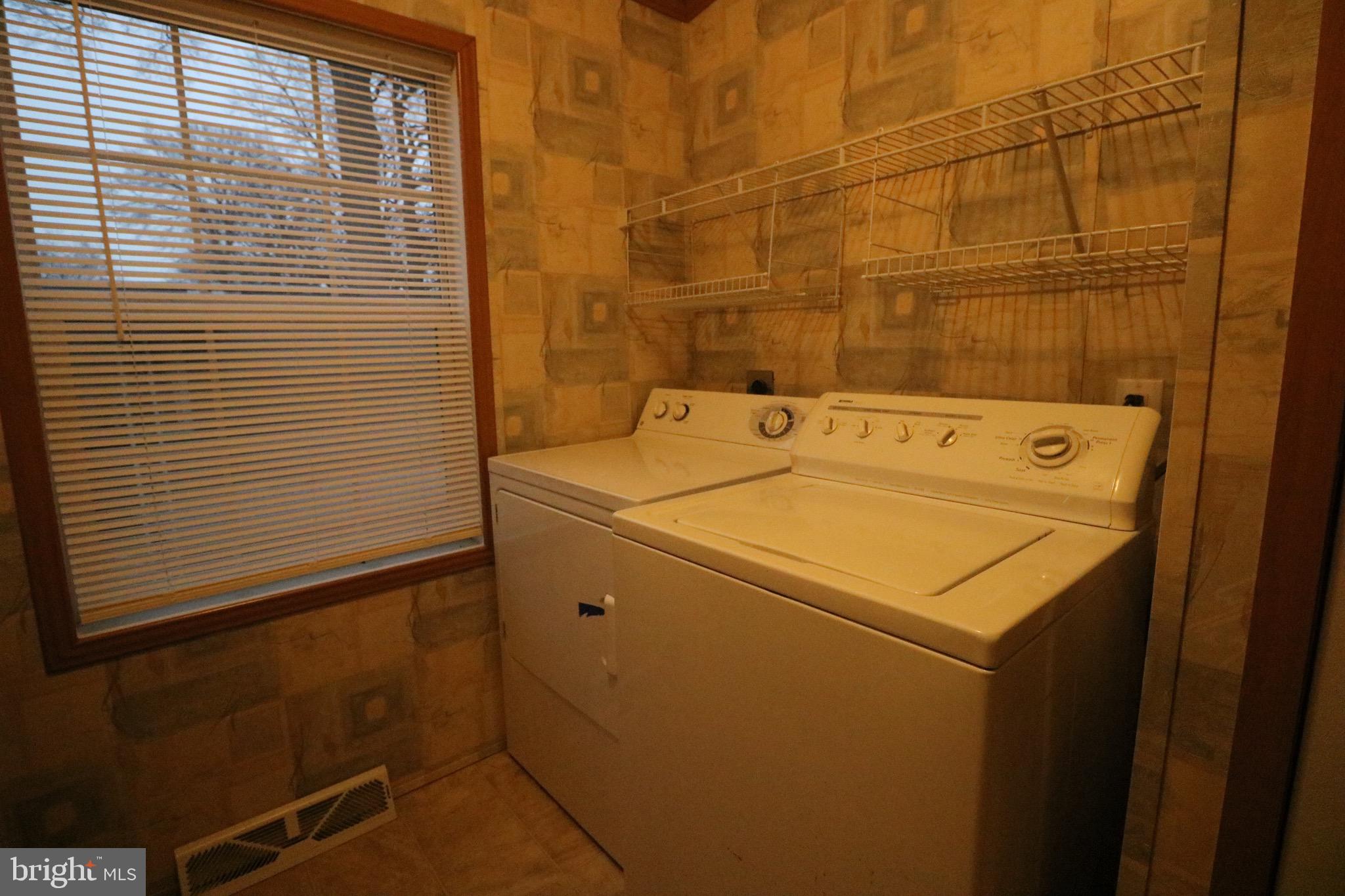 118 Conestoga Road Middle River, MD 21220 - Photo 17 of 38 a utility room with dryer and washer