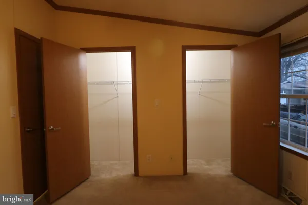 a view of empty room with windows
