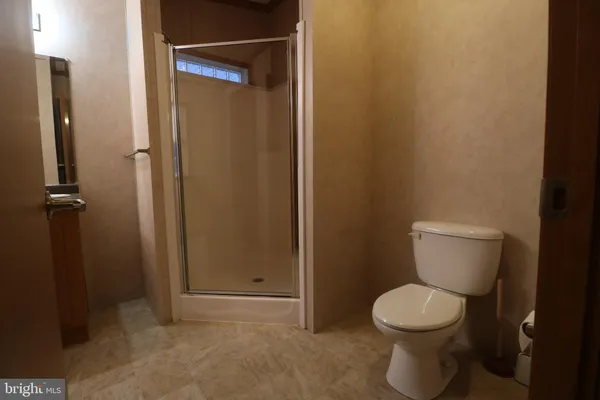 a bathroom with a toilet