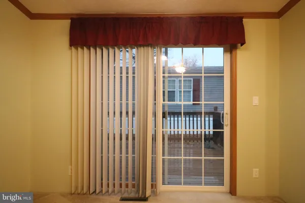 a view of a house with a large window