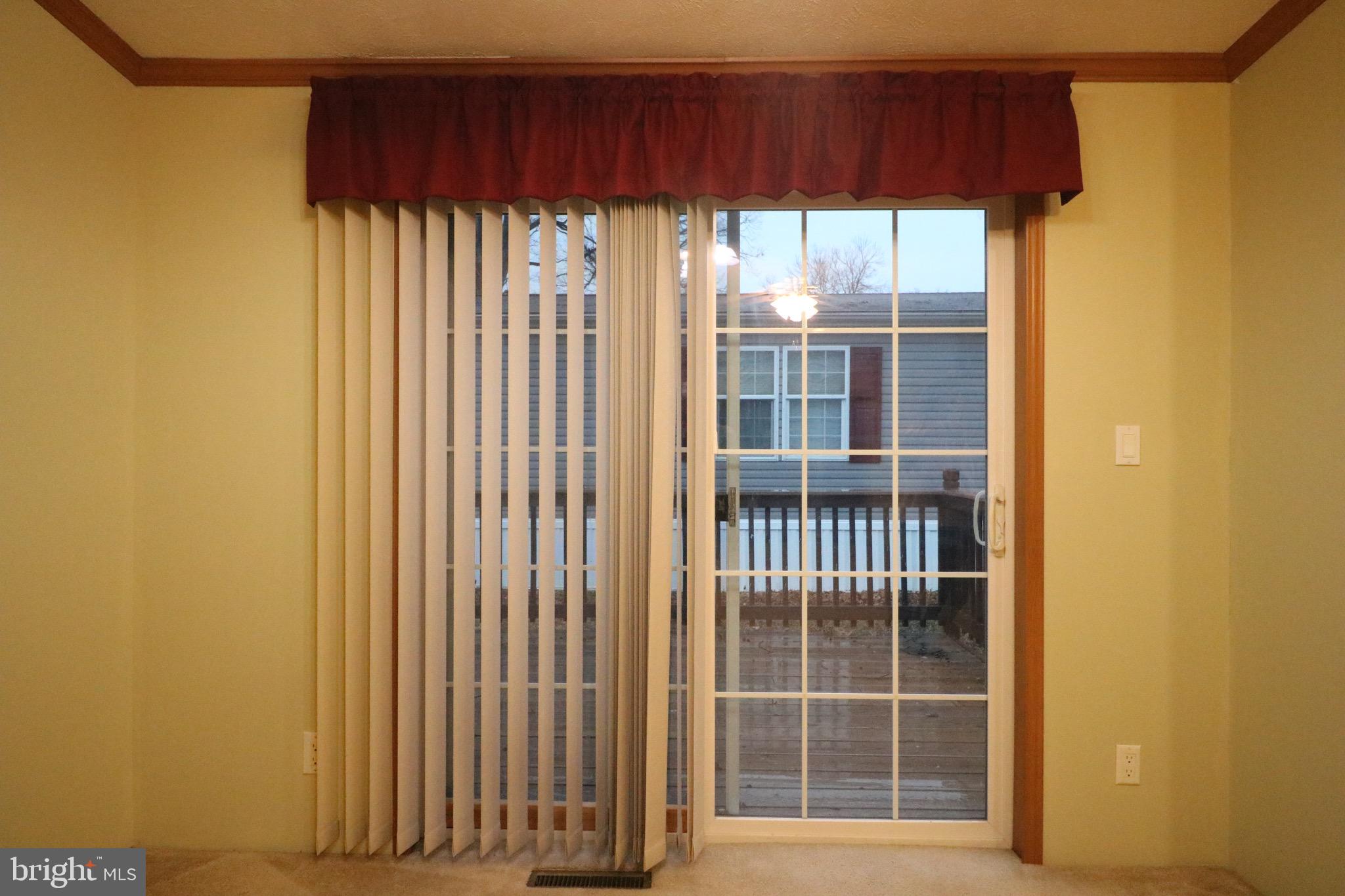 118 Conestoga Road Middle River, MD 21220 - Photo 10 of 38 a view of a house with a large window