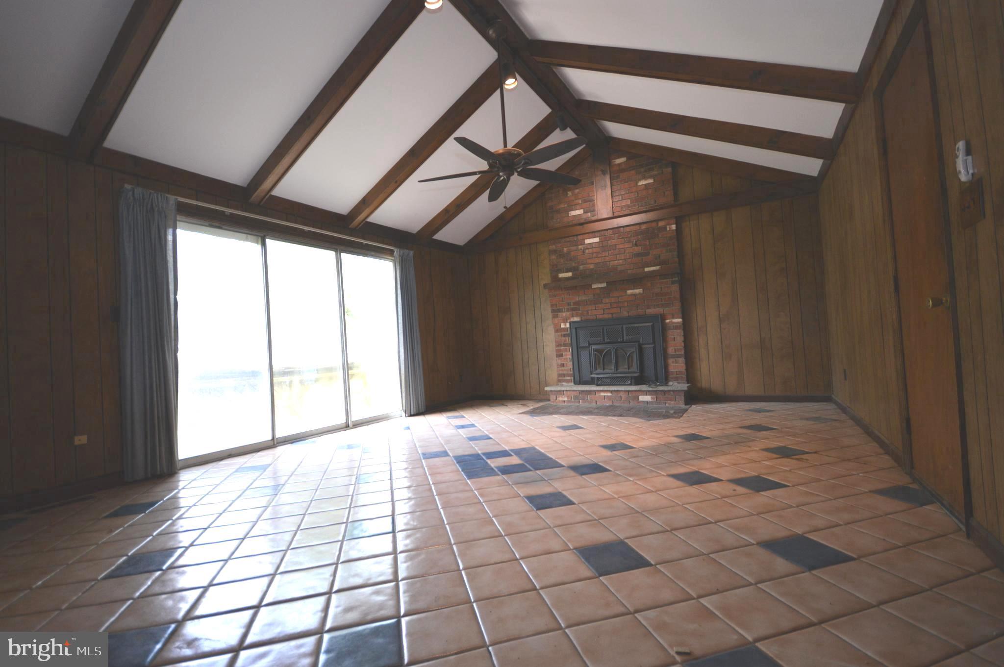 749 Street Road Cochranville, PA 19330 - Photo 25 of 35 Family room with Fireplace