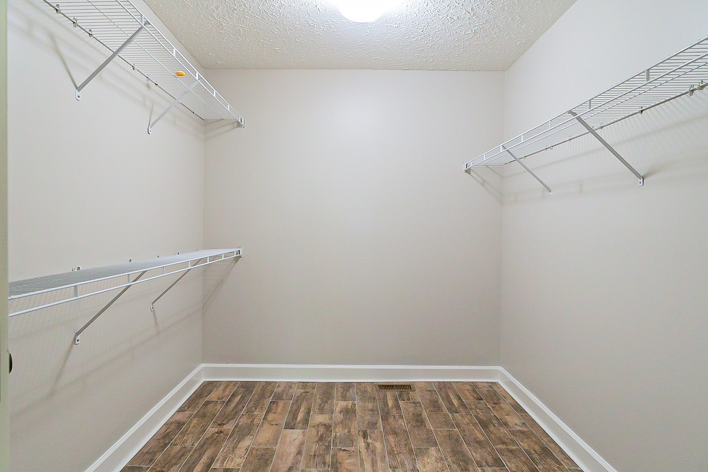 1604 Comanche Run Madison, TN 37115 - Photo 21 of 32 a view of a room with racks on the wall