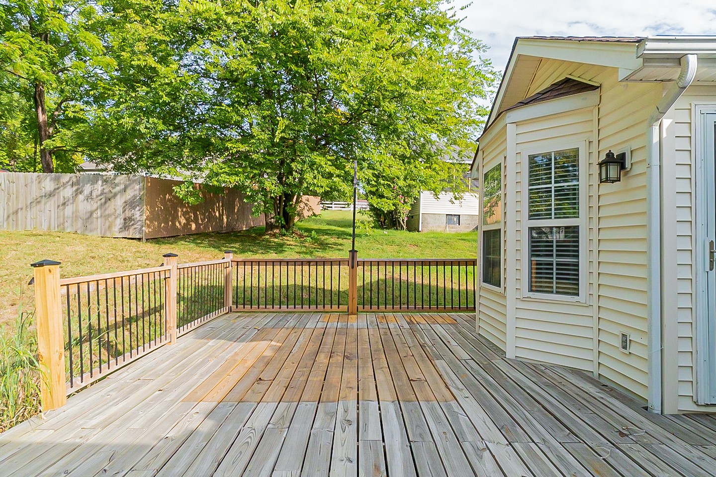 1604 Comanche Run Madison, TN 37115 - Photo 27 of 32 a view of a wooden deck with a yard