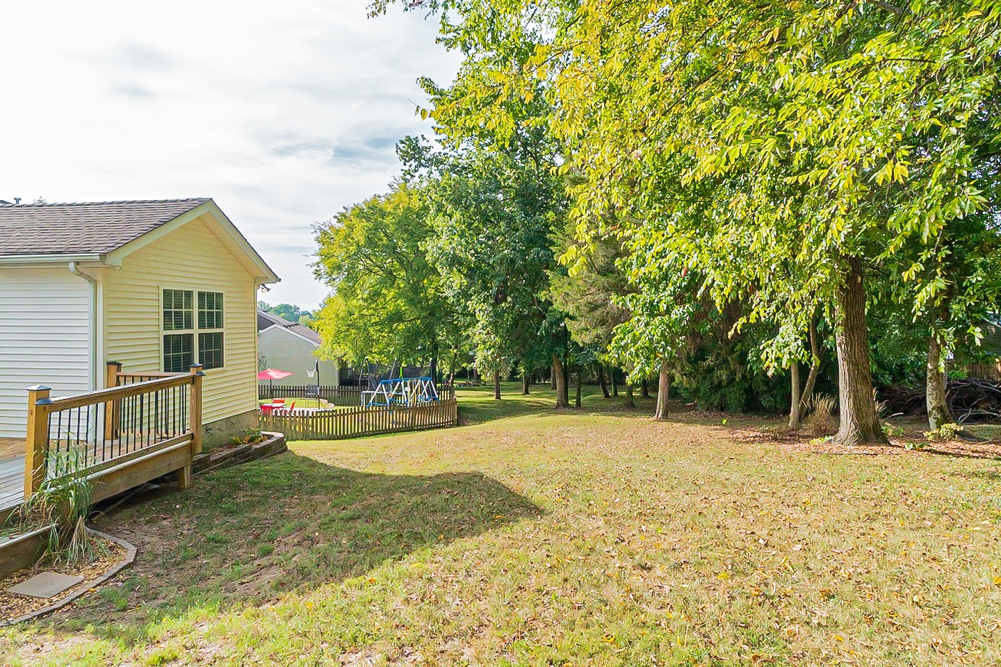 1604 Comanche Run Madison, TN 37115 - Photo 31 of 32 a house with trees in the background