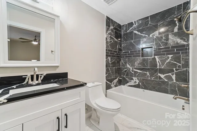 a view of swimming pool with seating space