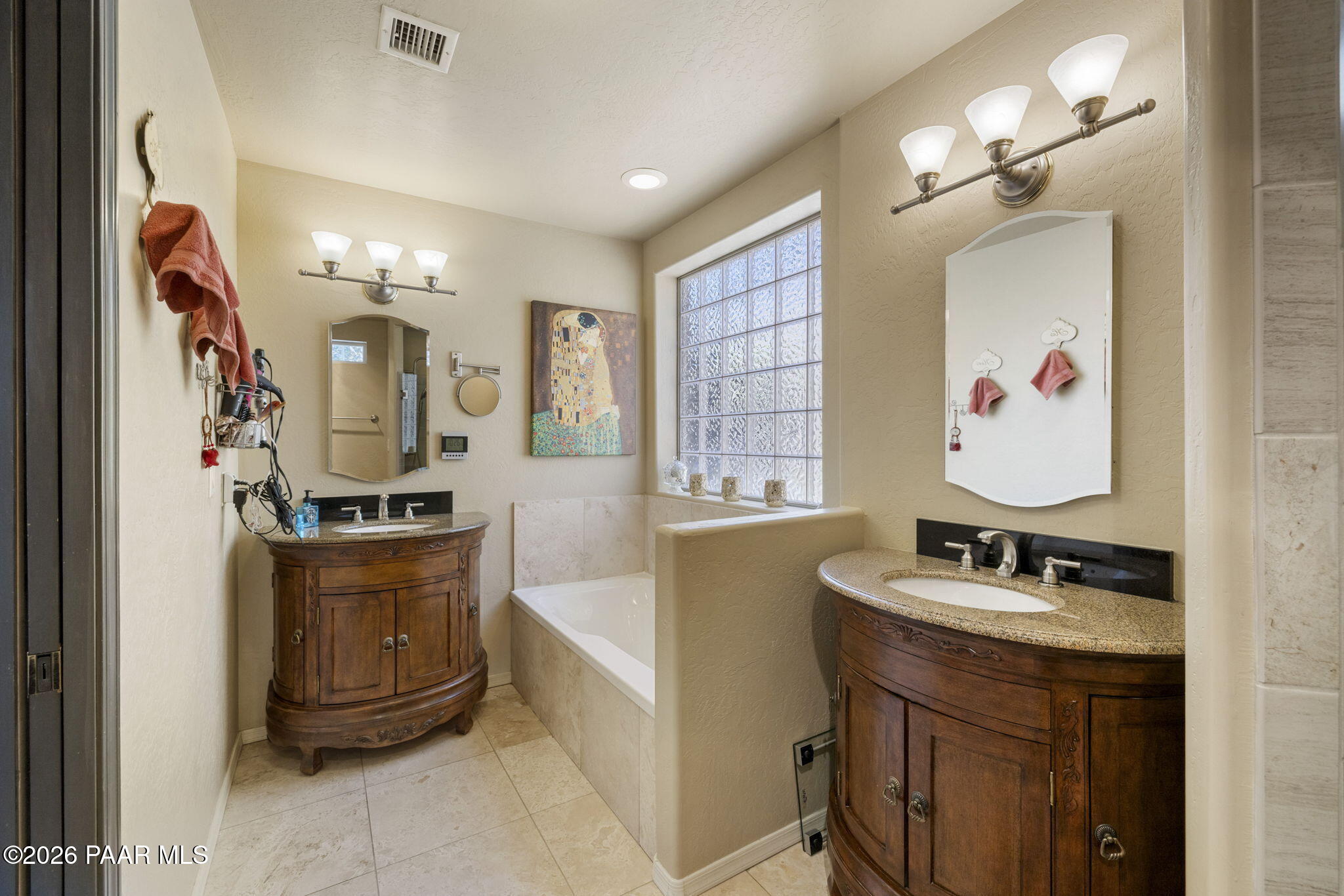 535 Copper Basin Road Prescott, AZ 86303 - Photo 23 of 41 a very nice looking room with a sink and a mirror