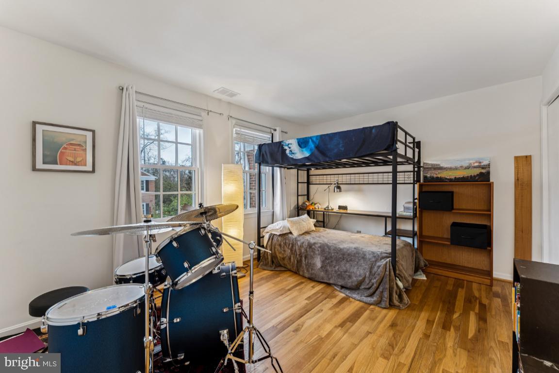 3559 Hamlet Place Chevy Chase, MD 20815 - Photo 12 of 26 a bedroom with furniture and a window