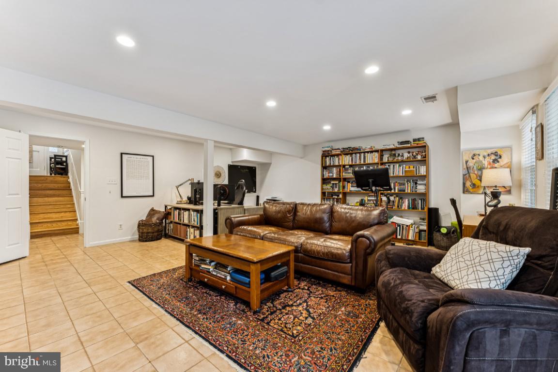 3559 Hamlet Place Chevy Chase, MD 20815 - Photo 15 of 26 a living room with furniture and wooden floor