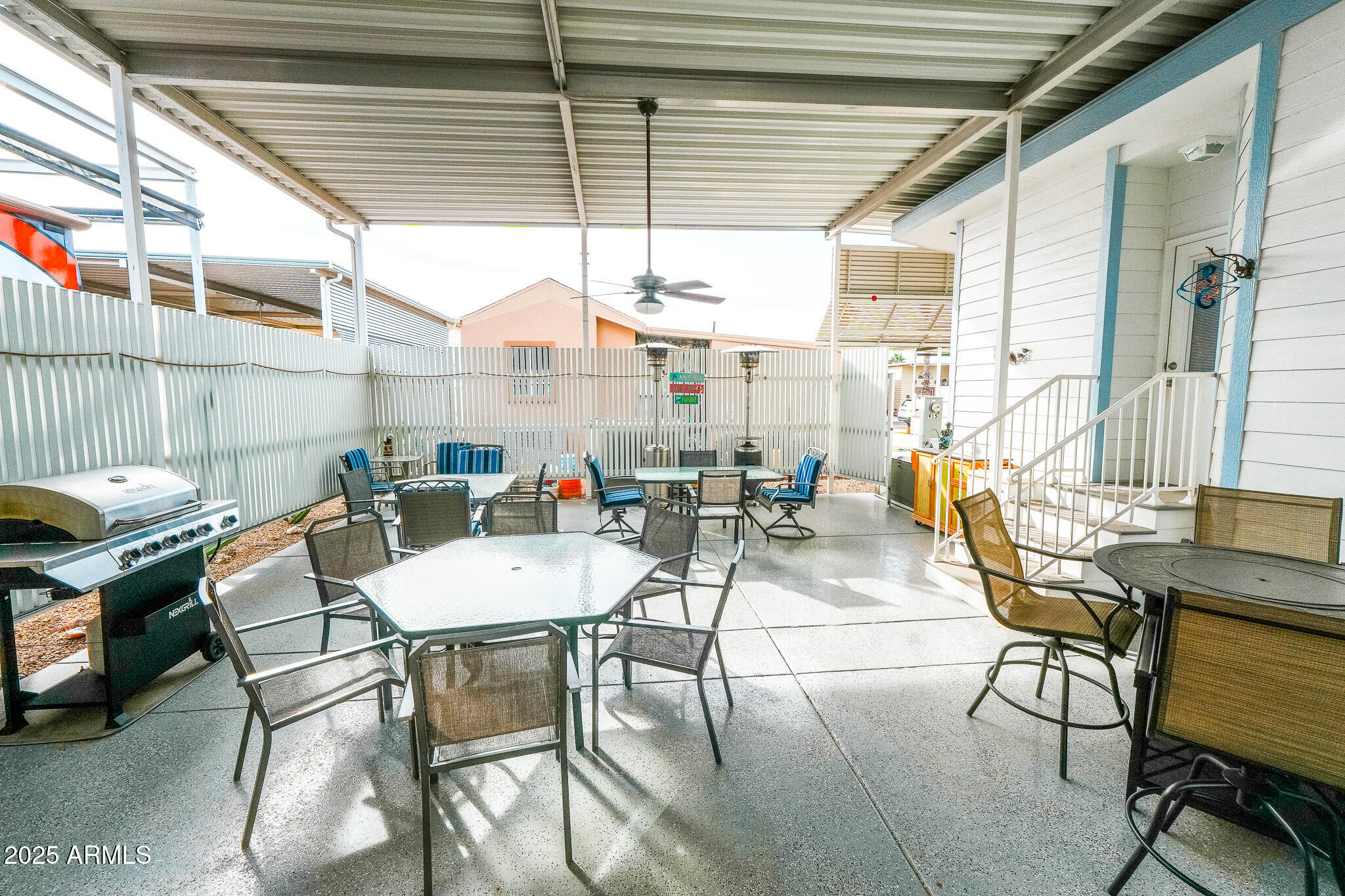 17200 West Bell Road, Unit 915 Surprise, AZ 85374 - Photo 16 of 32 a dinning table and chairs in the balcony