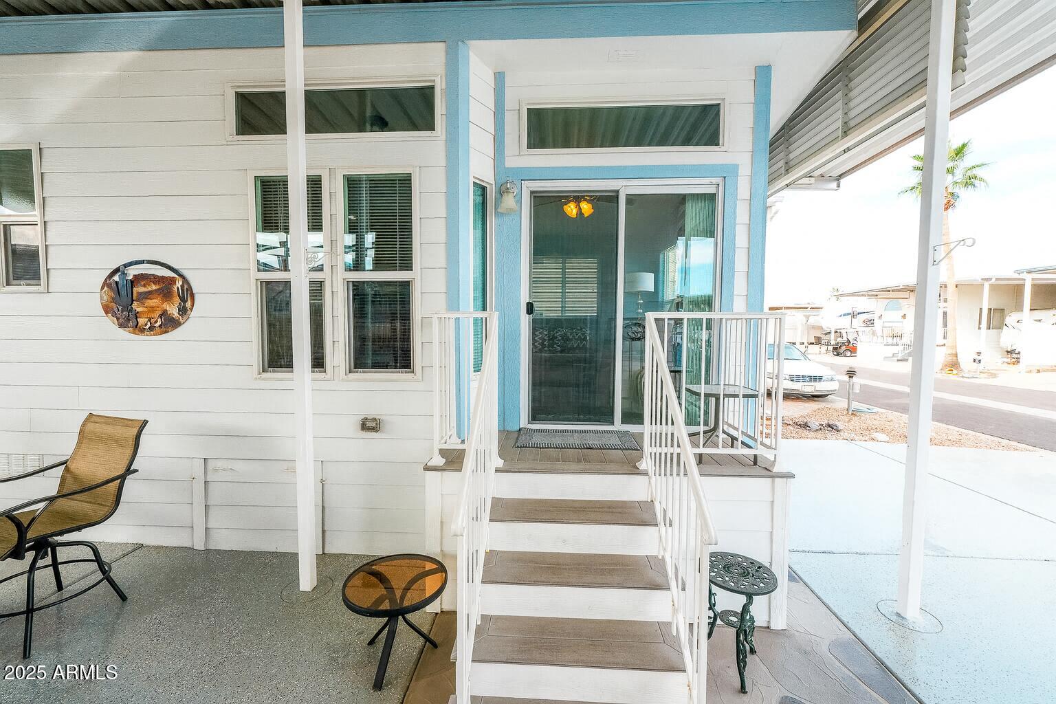 17200 West Bell Road, Unit 915 Surprise, AZ 85374 - Photo 20 of 32 a view of entryway with seating area