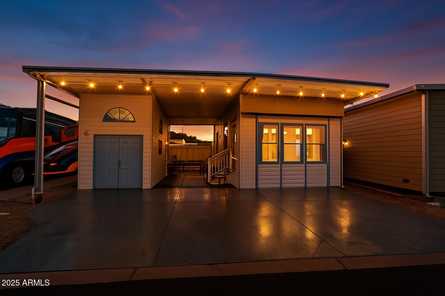 17200 West Bell Road, Unit 915 Surprise, AZ 85374 - Photo 7 of 32 a view of a living room with furniture and a floor to ceiling window