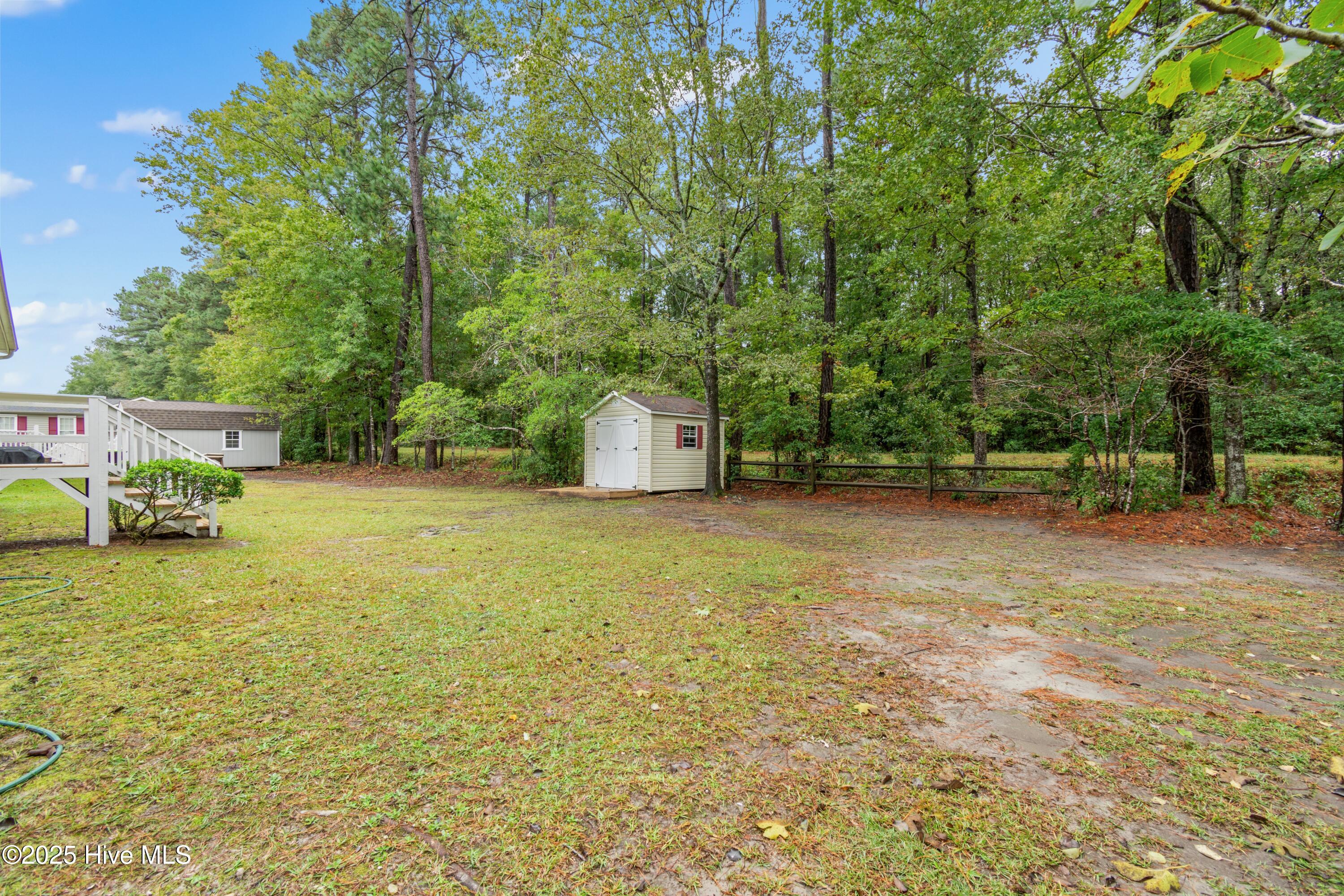 814 Watson Avenue Southwest Calabash, NC 28467 - Photo 29 of 35 back yard and building