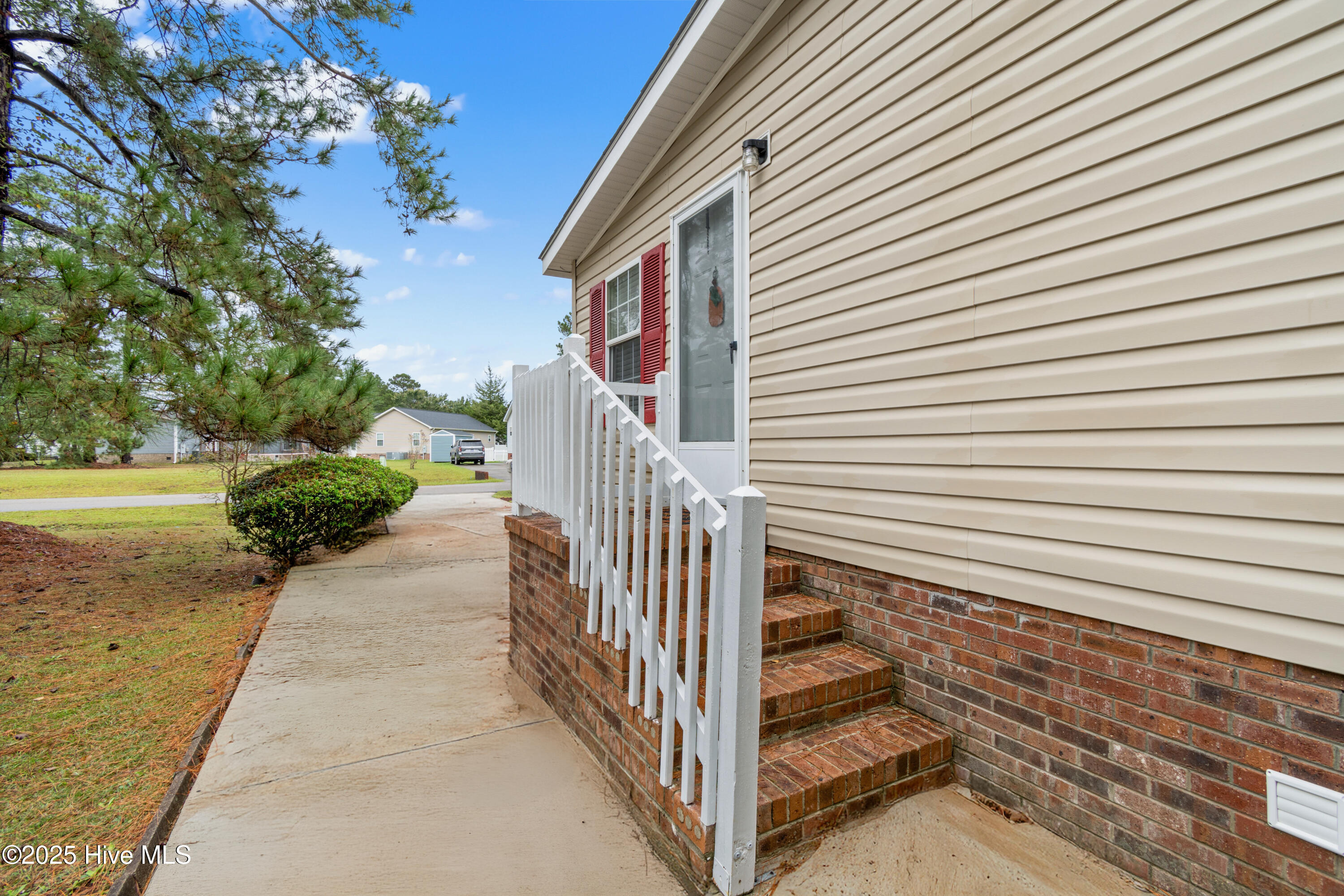 814 Watson Avenue Southwest Calabash, NC 28467 - Photo 5 of 35 Side door